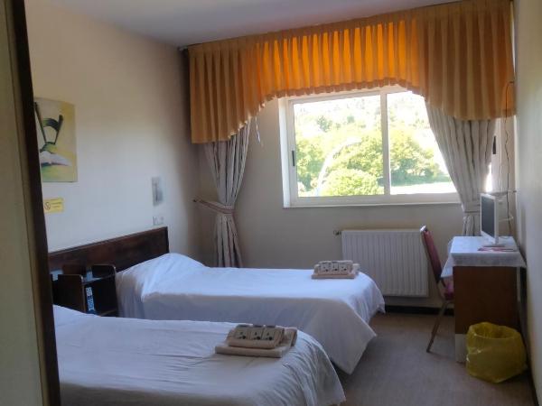 Casa de mamá : photo 2 de la chambre chambre double avec salle de bains privative