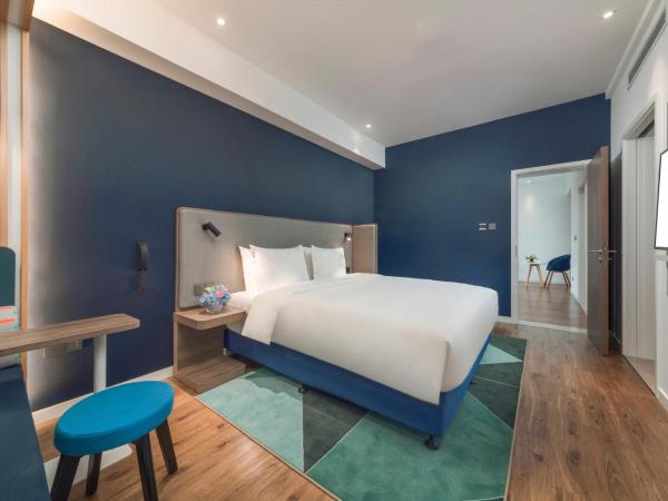 Holiday Inn Express Qingdao Chengyang Central, an IHG Hotel : photo 2 de la chambre suite 1 chambre