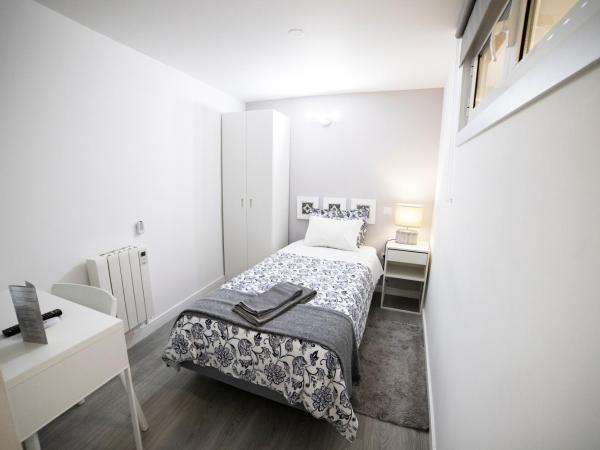 Guest House Triunfo : photo 2 de la chambre chambre simple donnant sur l’intérieur