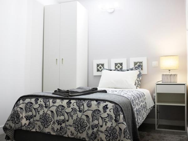 Guest House Triunfo : photo 1 de la chambre chambre simple donnant sur l’intérieur