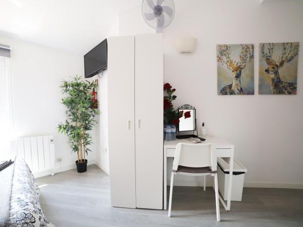 Guest House Triunfo : photo 5 de la chambre chambre familiale (4 adultes)