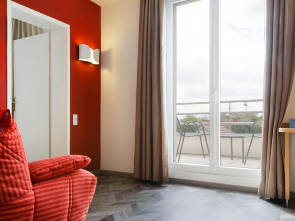 Logis Hôtel Beauséjour Colmar : photo 4 de la chambre suite familiale classique