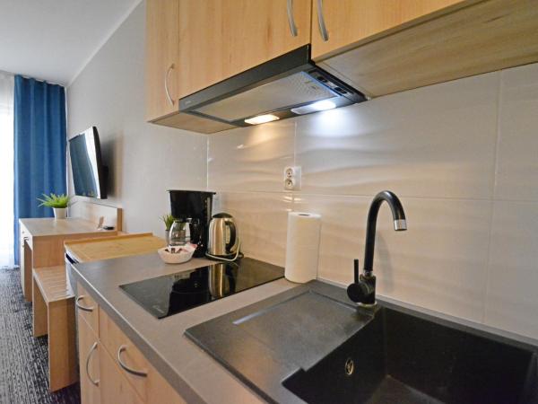 Apartamenty Cesarskie - Apartamenty Bryza - Parking : photo 8 de la chambre studio