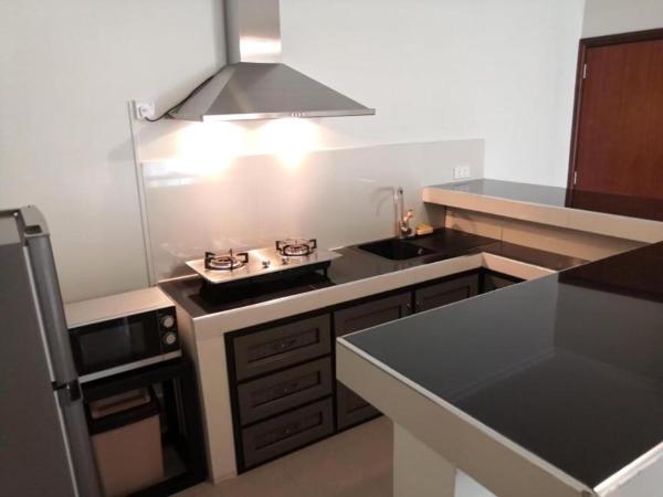 Morison Bay : photo 4 de la chambre suite familiale avec balcon