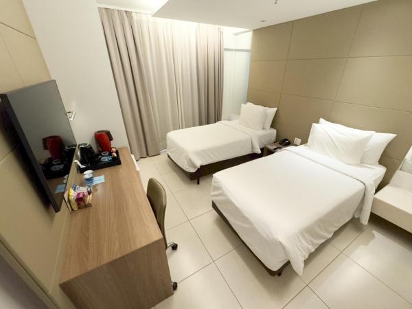 Hilton Garden Inn Belo Horizonte Lourdes : photo 2 de la chambre chambre lits jumeaux supérieure