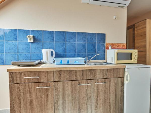 ADA Apartmanház : photo 7 de la chambre suite familiale