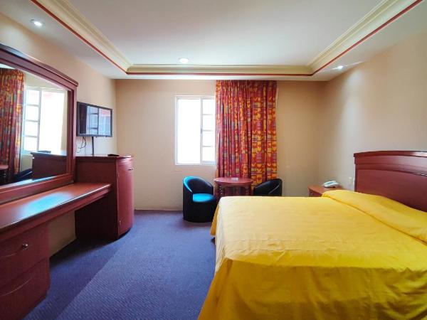 Auto Hotel Estrella del Sur : photo 3 de la chambre chambre lit king-size deluxe