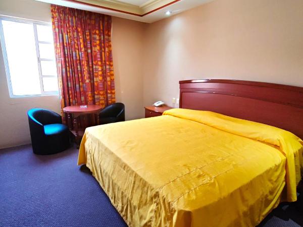 Auto Hotel Estrella del Sur : photo 2 de la chambre chambre lit king-size deluxe