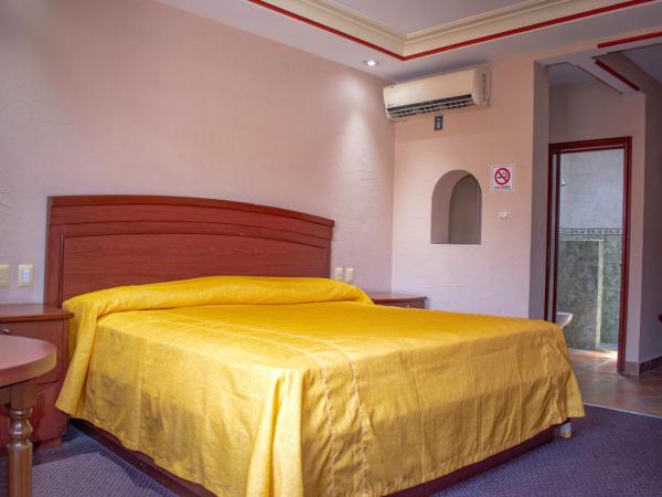 Auto Hotel Estrella del Sur : photo 4 de la chambre chambre lit king-size deluxe