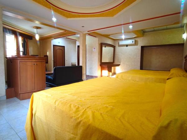 Auto Hotel Estrella del Sur : photo 2 de la chambre chambre double standard avec 2 lits doubles