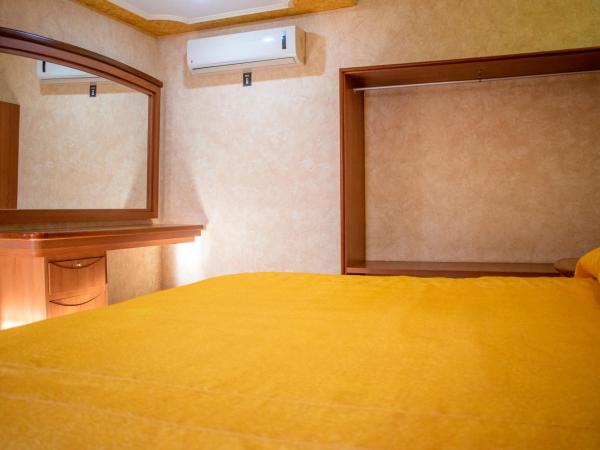 Auto Hotel Estrella del Sur : photo 10 de la chambre chambre double standard avec 2 lits doubles