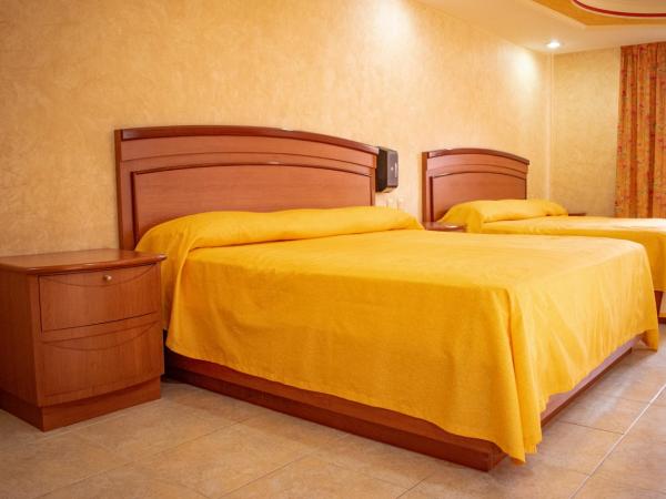 Auto Hotel Estrella del Sur : photo 8 de la chambre chambre double standard avec 2 lits doubles