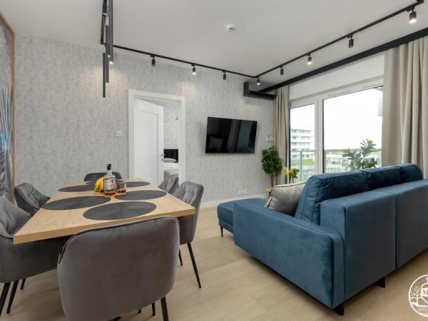 Polanki Aqua - Aquapark, Free Parking, Apartments M&M Kołobrzeg : photo 8 de la chambre family paradise apartment with air conditioninig and beach equipment