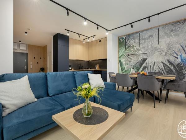 Polanki Aqua - Aquapark, Free Parking, Apartments M&M Kołobrzeg : photo 1 de la chambre family paradise apartment with air conditioninig and beach equipment