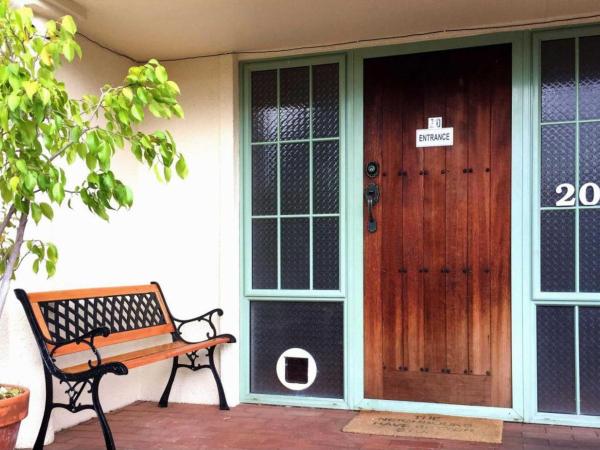 Rotorua Coachman Spa Motel : photo 5 de la chambre appartement confort 4 chambres avec bain à remous