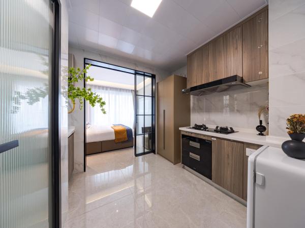 Xi Ke Executive Apartment - Shenzhen Futian Exhibition Center : photo 5 de la chambre chambre lit king-size - vue sur ville