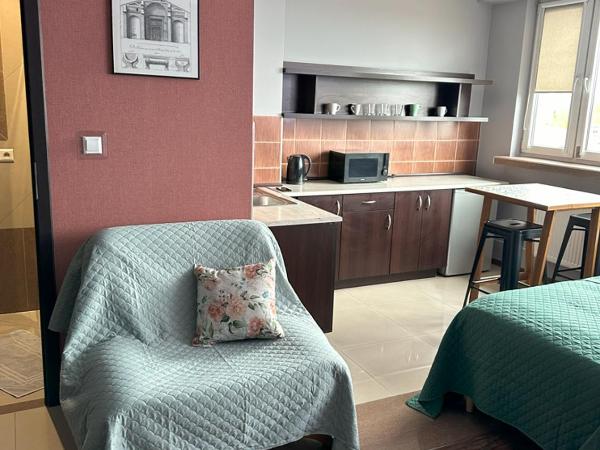 Apartamenty Komfort : photo 1 de la chambre chambre quadruple avec salle de bains privative