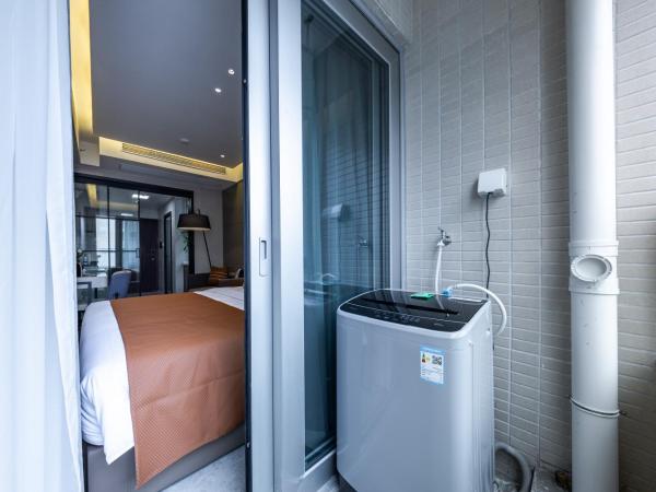 Boruisi Video and Audio Light House - Shenzhen Convention and Exhibition Center Gangxia Metro Station : photo 9 de la chambre chambre lit king-size supérieure