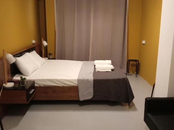 26 Amalias : photo 9 de la chambre chambre triple basique avec salle de bains commune