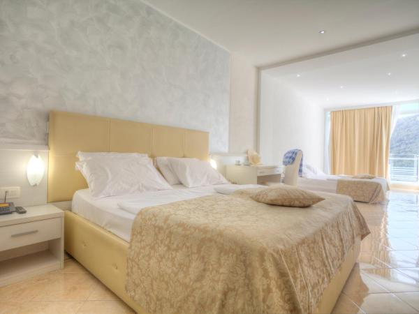 Hotel Hedera - Maslinica Hotels & Resorts : photo 1 de la chambre chambre double avec balcon - vue sur mer