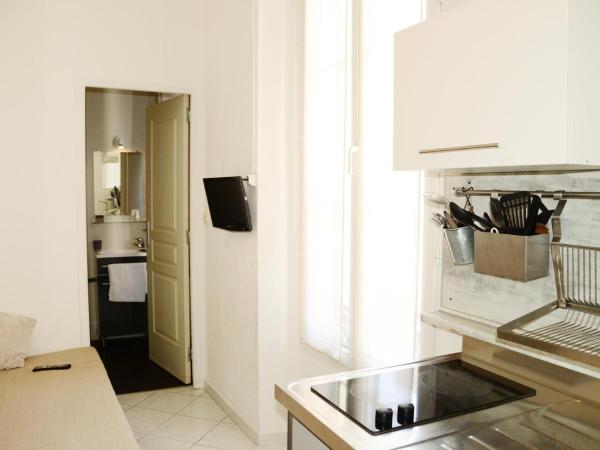 Hôtel L'Oustaou : photo 1 de la chambre studio