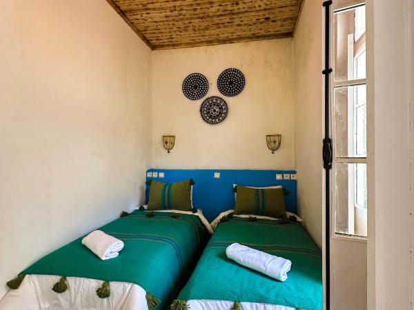 Riyad zen oasis : photo 2 de la chambre chambre lits jumeaux