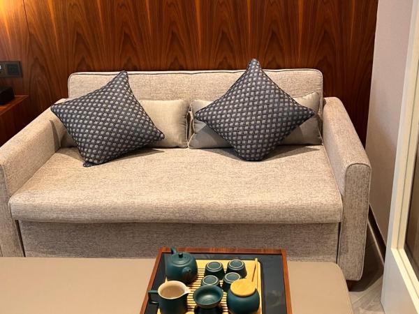 Sha Zhi Ye Serviced Apartment Hotel - Houjie Wanda Plaza Liaoxia Subway Station : photo 1 de la chambre chambre lit queen-size deluxe