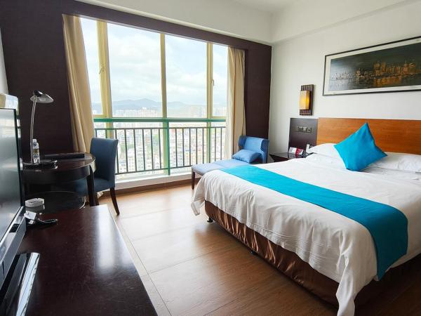 Shengyi Holiday Villa Hotel : photo 3 de la chambre chambre lit king-size - vue sur ville
