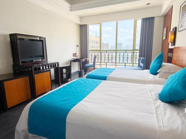 Shengyi Holiday Villa Hotel : photo 1 de la chambre chambre lits jumeaux - vue sur ville