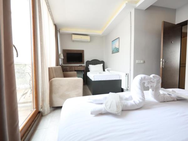 Bucoleon by Cheers : photo 3 de la chambre chambre triple deluxe