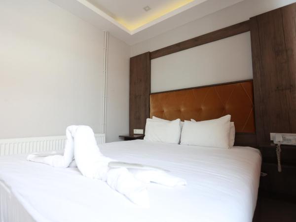 Bucoleon by Cheers : photo 5 de la chambre chambre triple deluxe