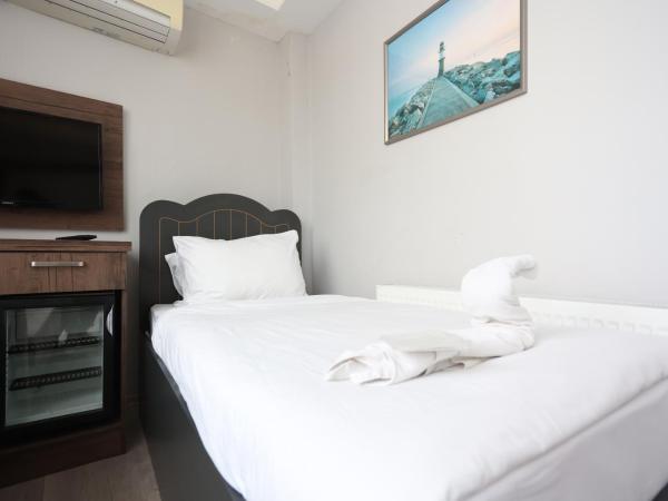 Cheers Lighthouse : photo 7 de la chambre chambre triple deluxe