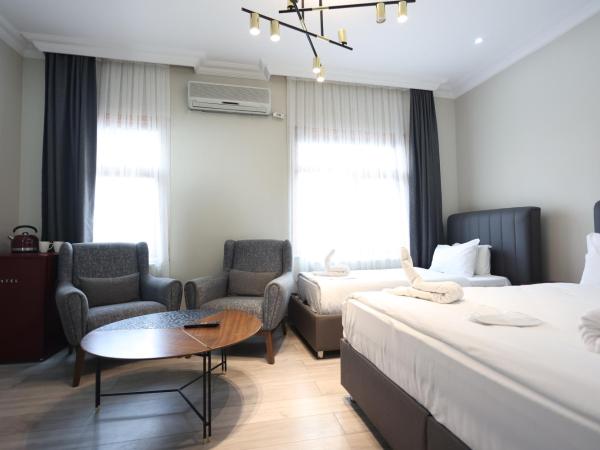 Bucoleon by Cheers : photo 1 de la chambre chambre triple standard