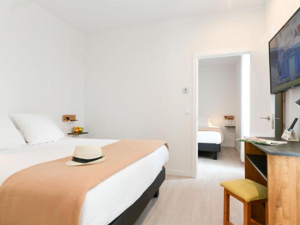 Logis Hotel & Restaurant Bergeret Sport : photo 1 de la chambre suite familiale
