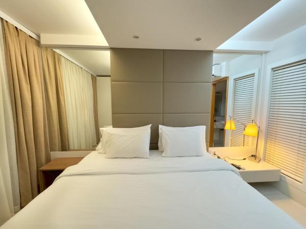 Hilton Garden Inn Belo Horizonte Lourdes : photo 1 de la chambre quarto deluxe com cama queen-size