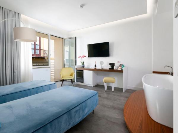 Hotel Tasso Suites & Spa : photo 1 de la chambre suite junior deluxe