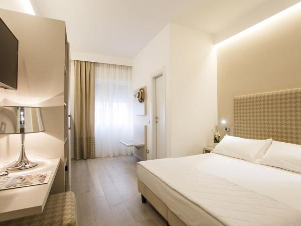 Hotel Grottamare : photo 1 de la chambre chambre quadruple