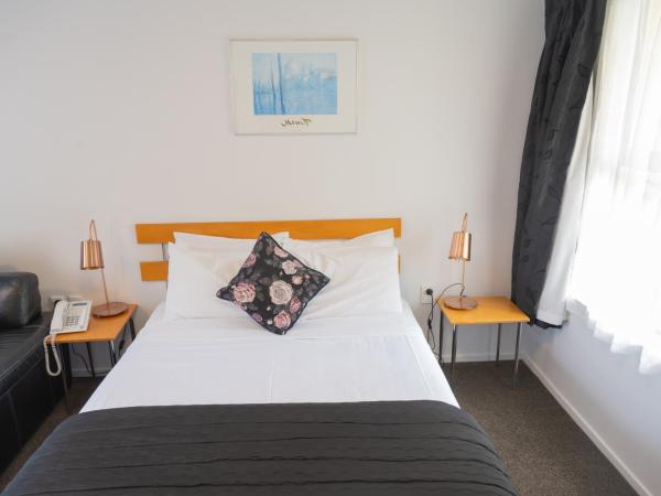 Victoria Court Motor Lodge : photo 5 de la chambre appartement 1 chambre avec baignoire spa