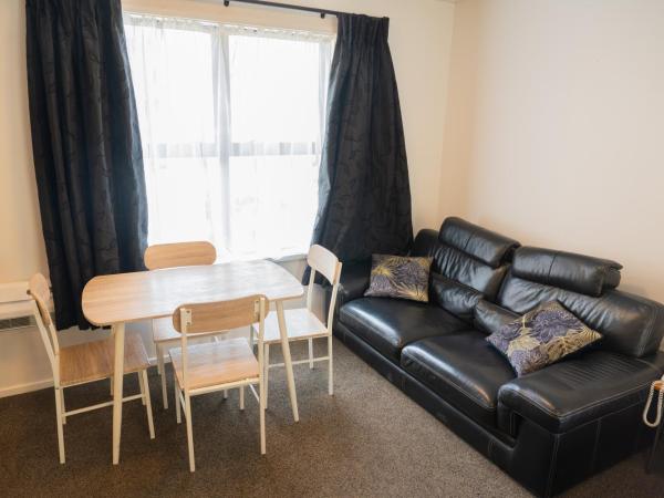 Victoria Court Motor Lodge : photo 4 de la chambre appartement 1 chambre avec baignoire spa