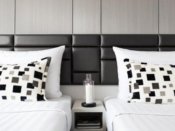 Stanford Hotel Hong Kong : photo 2 de la chambre hébergement double ou lits jumeaux - vue sur toits