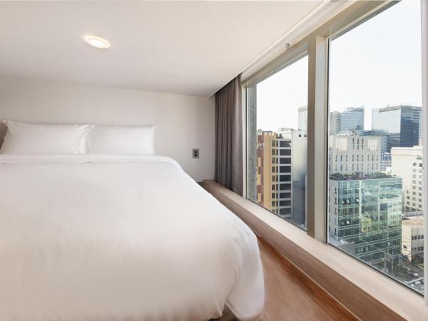 Travelodge Myeongdong Namsan : photo 6 de la chambre friends and family quadruple