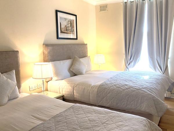 Baggot Court Townhouse : photo 1 de la chambre chambre lits jumeaux