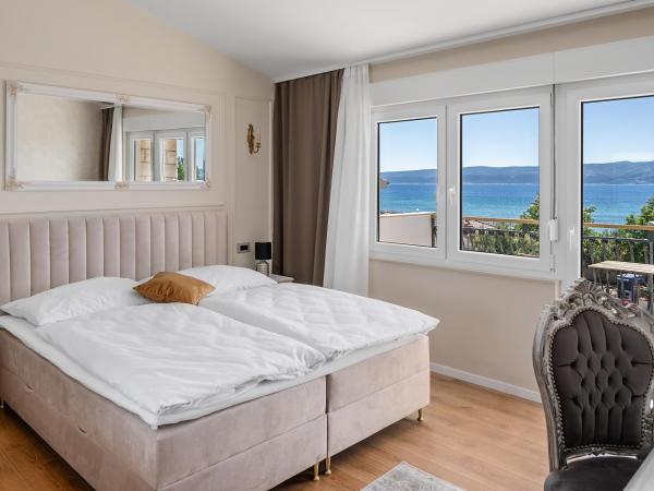 Storge Boutique Bed & Breakfast : photo 2 de la chambre chambre double deluxe - vue sur mer