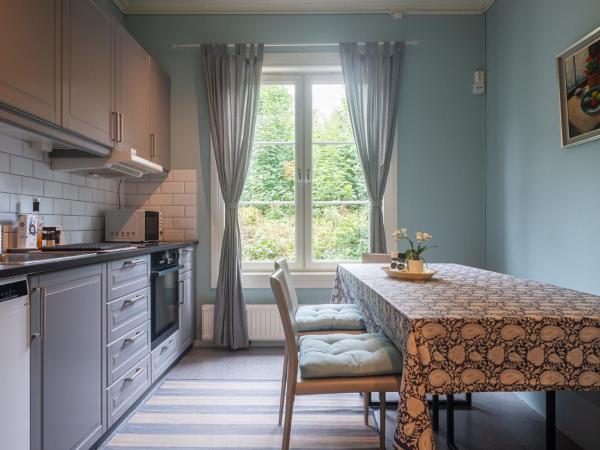 Kollen Slottet : photo 1 de la chambre chambre triple - vue sur jardin