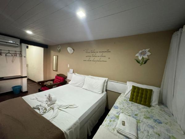 Lua Nova Ferradurinha Buzios : photo 3 de la chambre chambre triple - vue sur ville