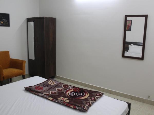 Friendlystay Prime : photo 2 de la chambre chambre lit queen-size avec balcon