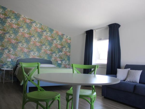 LIDO DEL FARO : photo 3 de la chambre chambre quadruple - vue sur mer