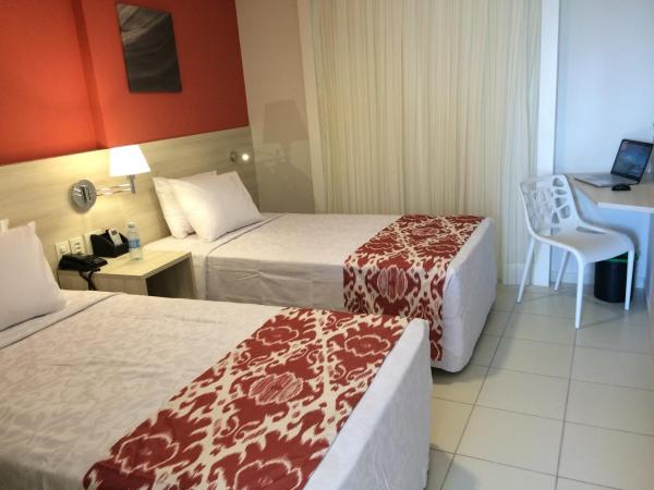 Comfort Hotel & Suites Natal : photo 5 de la chambre chambre lits jumeaux supérieure