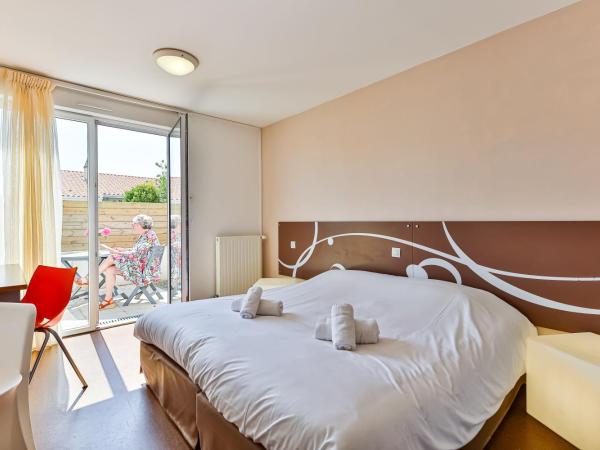 Village Club La Rivière CapFrance : photo 5 de la chambre chambre quadruple confort