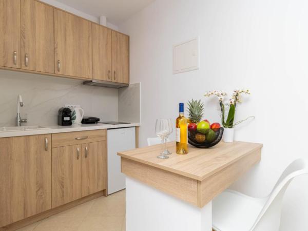 Overview Mykonos Apartments : photo 10 de la chambre suite - vue sur jardin